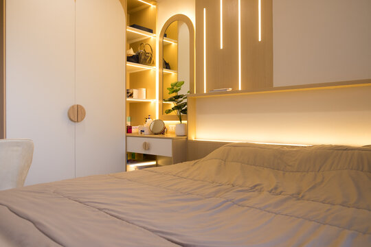 Example built in Interior design by bedroom, living room, walk in closet, makeup room, wardrobe and shoe rack in Condominium or home office Decorate warm light for family and couple lover concept.