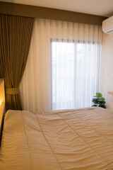 Example built in Interior design by bedroom, living room, walk in closet, makeup room, wardrobe and shoe rack in Condominium or home office Decorate warm light for family and couple lover concept.