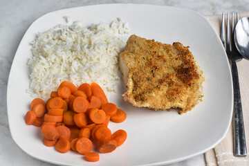  baked haddock   with rice and carrots