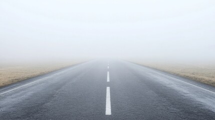 A long stretch of wet asphalt vanishes into thick mist under a tranquil atmosphere
