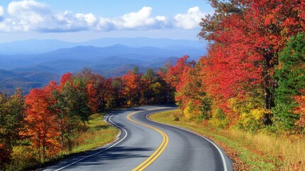 Naklejka premium Scenic Autumn Road with Colorful Foliage
