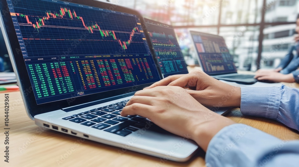 Wall mural financial analysis on laptop with stock market data