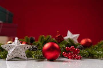 Christmas decoration on red background with copy space