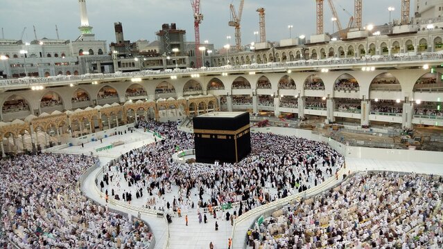 Aerial shot of people doing tawaf around the Holy Kaaba in Saudi Arabia