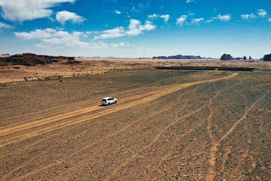 Car on desert road