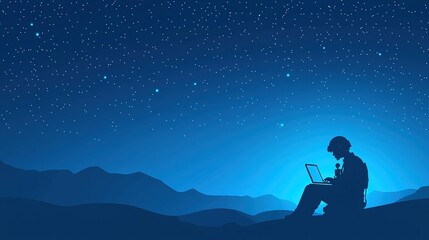 Fototapeta premium A silhouette working on a laptop under a starry night sky on a mountain top