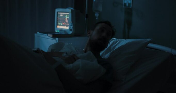 Guy in hospital wakes up suddenly, yanks out tubes, and runs off.