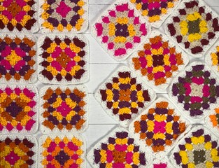 Fototapeta premium Crochet granny squares samples multicolor different colors photo handmade craft hobby 