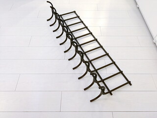 A subject photo shoot of black grilles for fireplaces.