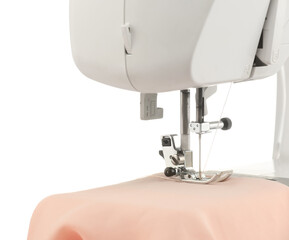 Sewing machine with cloth isolated on white