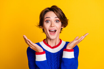 Photo portrait of lovely young lady raise hands excited news dressed stylish blue knitted garment...