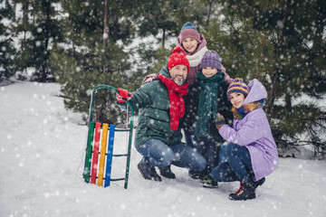 Full size photo of full peaceful family embrace spend free time weekend snowfall weather outside