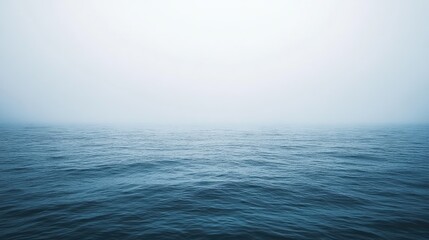 Obraz premium Tranquil Ocean Scene in Misty Atmosphere