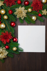 Blank White Card with Christmas Decorations and Pine Branches