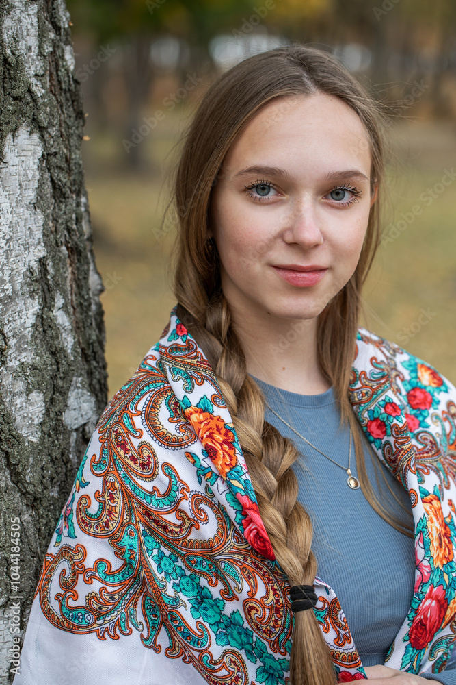 Wall mural Russian beauty - young beautiful woman in a traditional headscarf