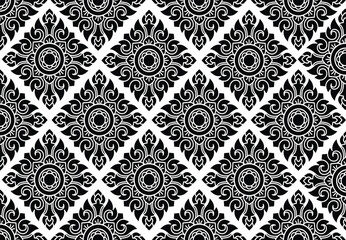 Geometric Indonesian batik motifs with distinctive Balinese floral pattern