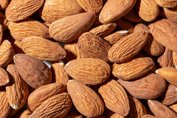 Scattered Almonds. Background from Almond Nuts. Natural High-Calorie Snacks