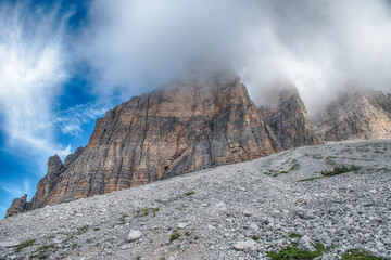 Clouds enveloping the iconic Tre Cime di Lavaredo mountains, italy