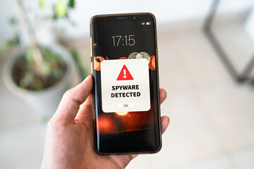 New spyware alert notification on the smart phone. Concept of stealing personal data