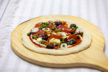 Authentic Portuguese pizza prepared with classic ingredients. Vera pizza
