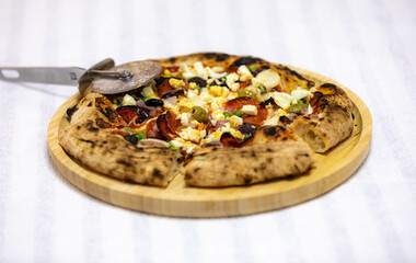 Authentic Portuguese pizza prepared with classic ingredients. Vera pizza