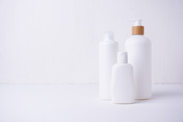 Cosmetic bottle mockup, with cream background, mockup for your product branding