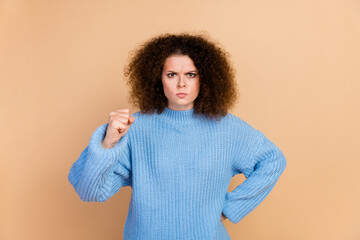 Photo portrait of lovely young lady annoyed pose dressed stylish blue knitwear garment isolated on...