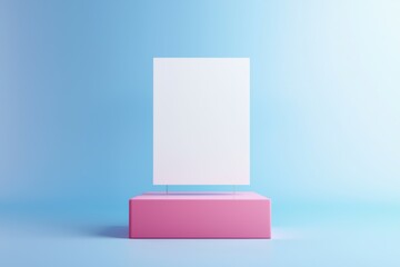 A white sign is on a pink base