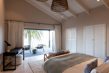 At home, Cozy bedroom with ocean view, featuring elegant decor and natural light