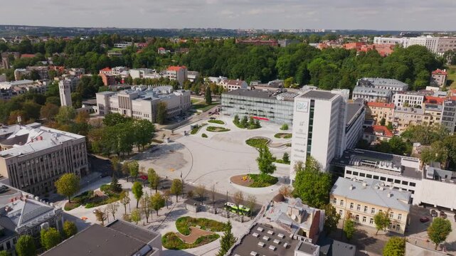 Camera slowly pans over Unity Square in Kaunas, Lithuania, showing the urban planning and architecture of the city center