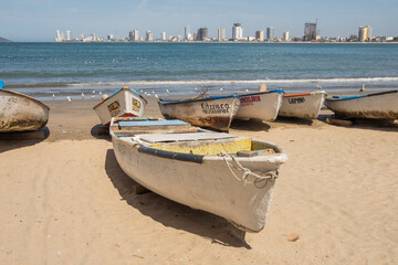 Artisanal fishing boats on the beach in Mazatlan, Mexico