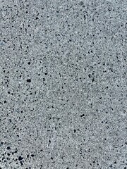 Fall foliage in a blend of amber, gold, and rust colors, captured under soft lighting that accentuates the leaf textures and seasonal atmosphere.