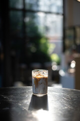 glass of coffee with milk on the table