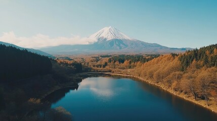 Serene Landscape with Snow-Capped Mountain and Lake