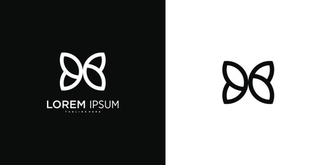 Butterfly logo design with a simple and modern shape. Premium Vector