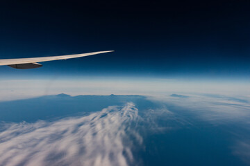View from an airplane of the Kuril Islands and Sea of Okhotsk on a flight from Vancouver to Tokyo