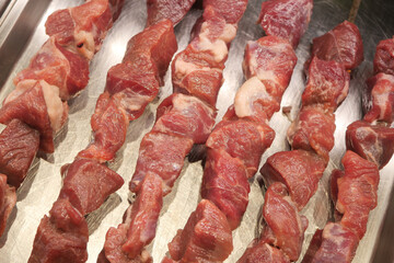 Delicious Raw Meat Skewers Prepared and Ready for Grilling to Perfection and Enjoyment