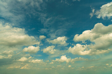 Tropical summer blue sky fluffy white cloud summertime on light sunny day cloudscape. Clear bright blue skyline spring sunlight climate background. Heaven blue environment ecology high scenic nature.