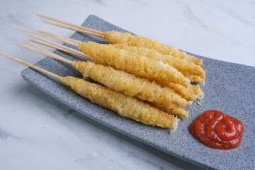 Telur Gulung or Fried Rolled Egg with Skewers, Indonesian Street Food