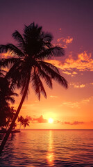 Sunset on a tropical coast with palm tree silhouettes and a glowing sky 