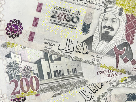 200 Saudi Riyal currency paper close up, finance and business concept background