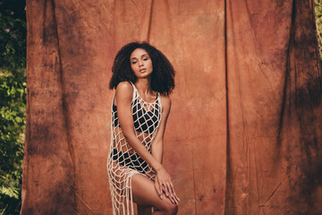 Fototapeta premium Photography of hot passionate girlfriend photo session in forest isolated on brown textile background