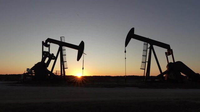 Sunset over Texas oil field