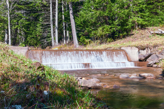 A man made waterfall along the road to the Bald Knob scenic overlook