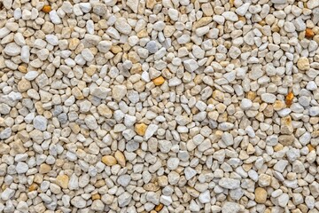 Seamless plain white texture background of small crushed rocks