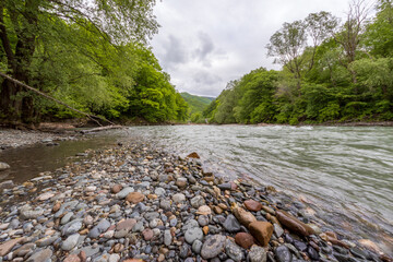 nature park , spring mood, a walk along the riverbed with an overview of the stone riverbed