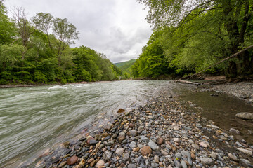 nature park , spring mood, a walk along the riverbed with an overview of the stone riverbed