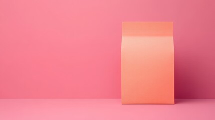 Pastel pink background with a blank packaging box for product presentation.