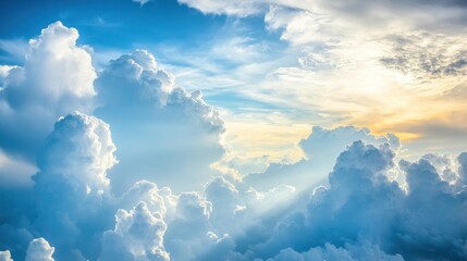 A serene sky filled with fluffy clouds and soft sunlight breaking through.
