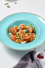 Minimalist Caesar Salad with Shrimp on a Pastel Plate with Empty Space